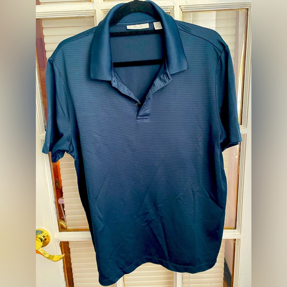 Men’s Airflux Solid Golf Polo.                        Ribbed collar machine wash